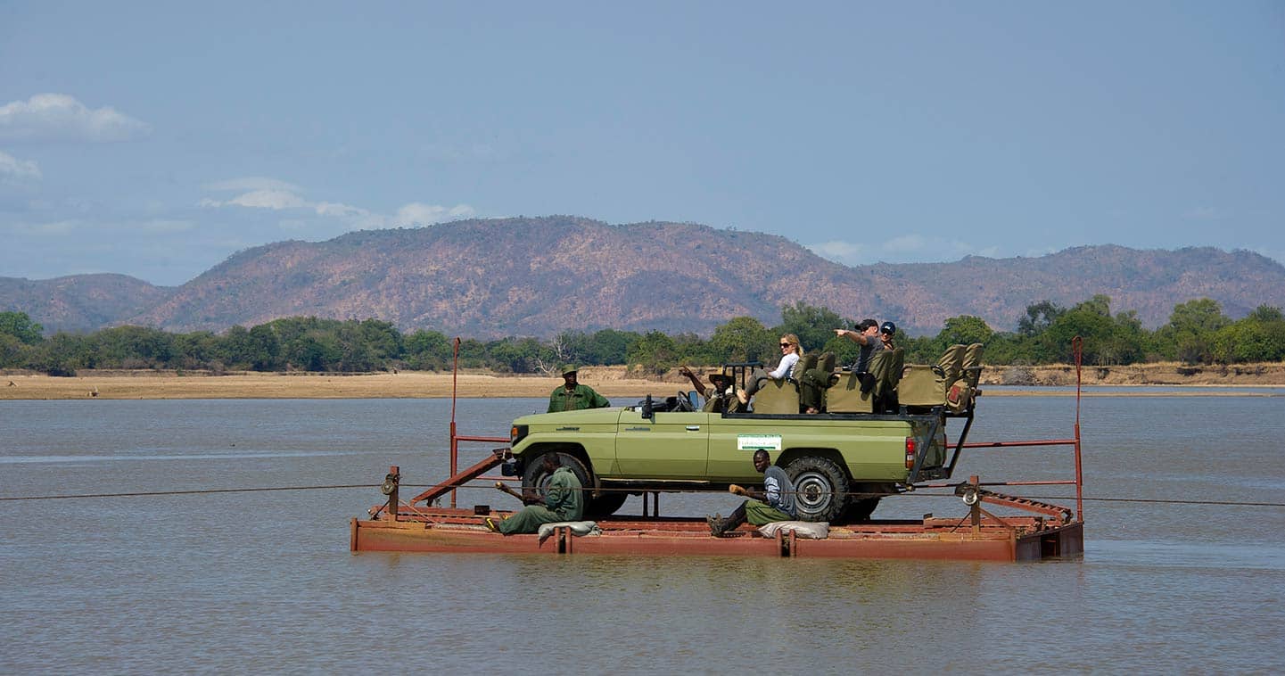 Cross the River While on game drive with Flatdogs Camp in South Luangwa National Park